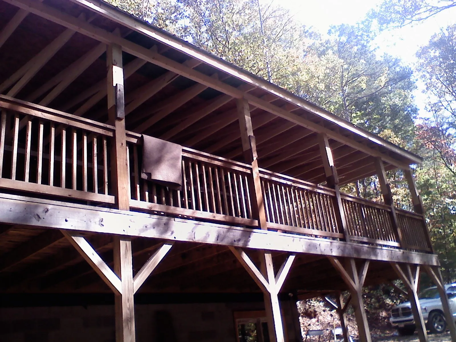 Timber framing under a new elevated porch and deck — Roof Leak Repair in Hardwick by Roofing Brothers